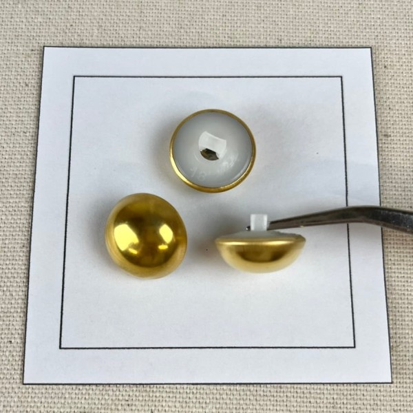 Bouton plastique arrondi doré 17mm Bouton plastique arrondi doré 17mm