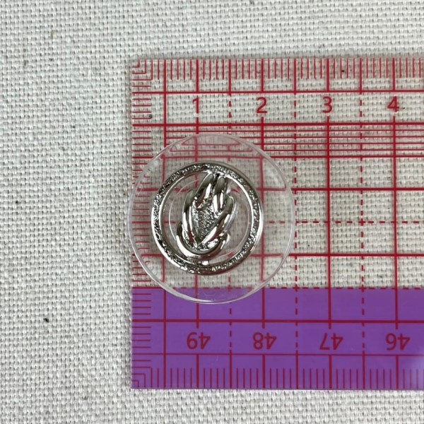 Bouton plastique nœud marin argenté 25mm Bouton plastique nœud marin argenté 25mm