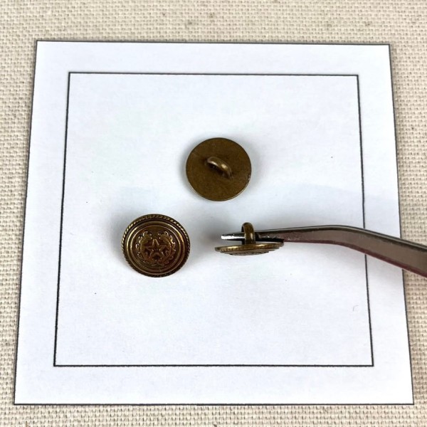 Bouton métal étoile laurier bronze S 12mm Bouton métal étoile laurier bronze S 12mm