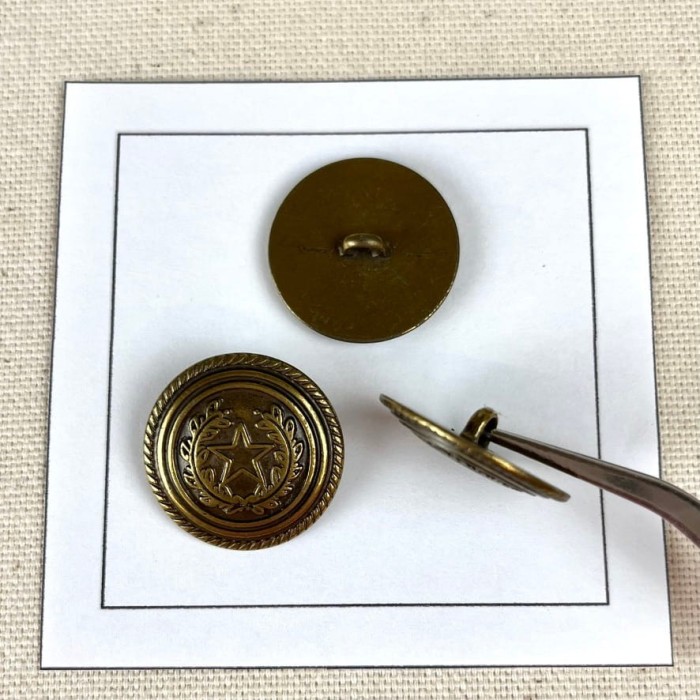 Bouton métal étoile laurier bronze L 23mm Bouton métal étoile laurier bronze L 23mm