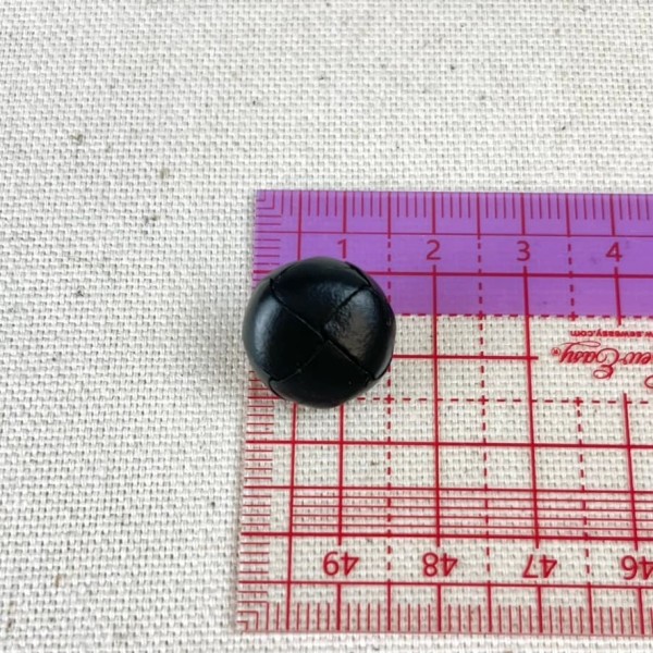 Bouton en cuir nœud noir 15mm Bouton en cuir nœud noir 15mm