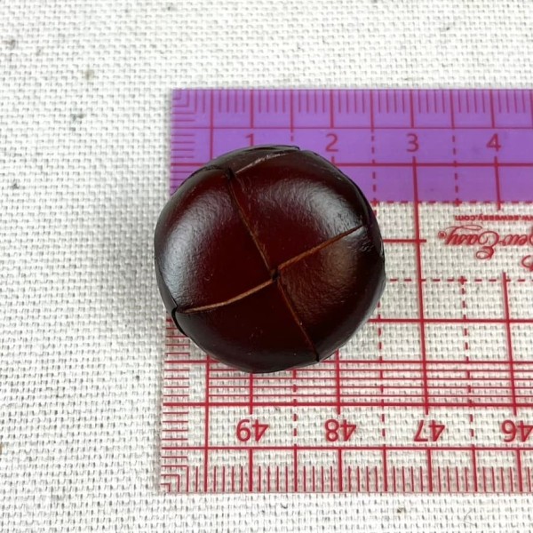 Bouton en cuir nœud marron foncé 26mm Bouton en cuir nœud marron foncé 26mm