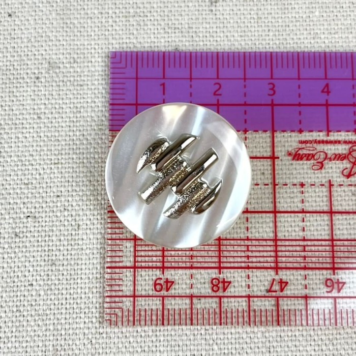 Bouton plastique blanc décoré argenté 25mm