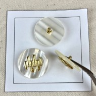 Bouton plastique blanc décoré doré 25mm