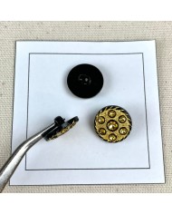 Bouton plastique bijou doré noir 18mm