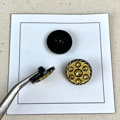 Bouton plastique bijou doré noir 18mm