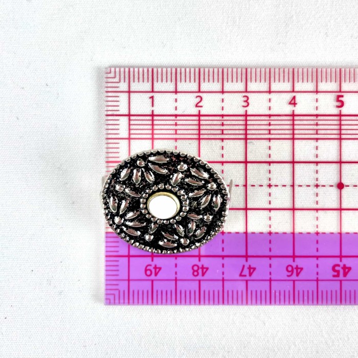 Bouton à griffe rond fleur en argent