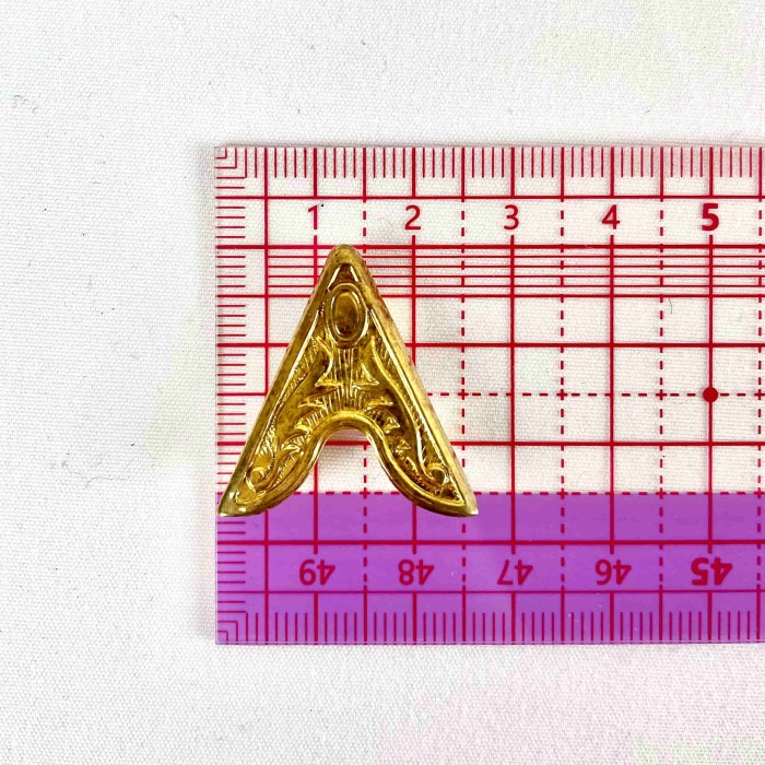 Bouton à griffe "A" à ornement doré