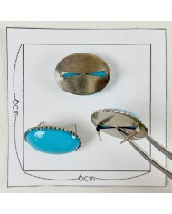 Bouton à griffe ovale bleu