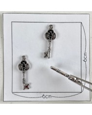 Charm clé argenté