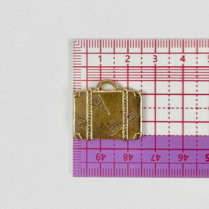 Charm valise doré Charm valise doré