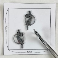 Charm rond argenté Charm rond argenté