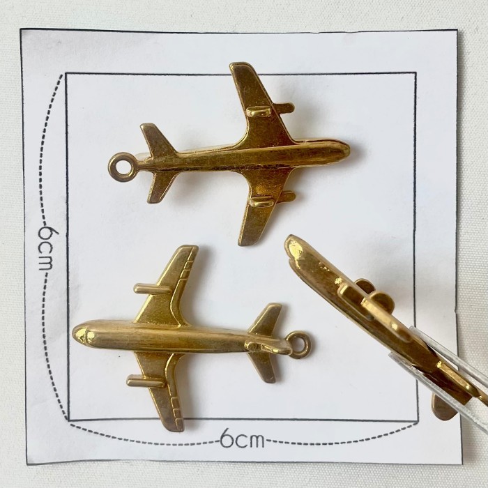 Charm avion doré Charm avion doré