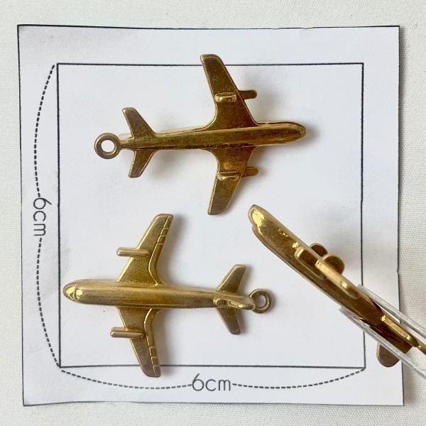 Charm avion doré Charm avion doré