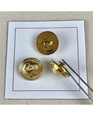 Bouton plastique ancre marine arrondi doré 20mm Bouton plastique ancre marine arrondi doré 20mm