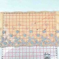 Dentelle fleurs multi-couleur sur tulle orange 21cm