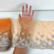 Dentelle fleurs multi-couleur sur tulle orange 21cm
