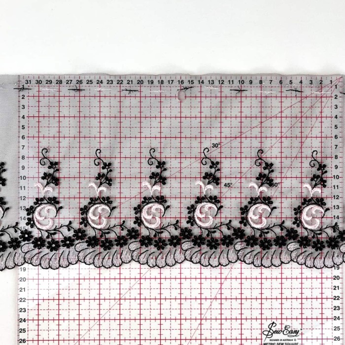 Dentelle festonée rose sur tulle noir 19cm