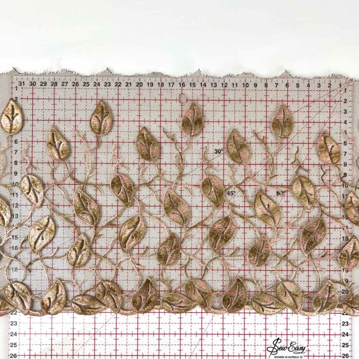 Dentelle feuilles bronzes rosés sur tulle marron 22cm