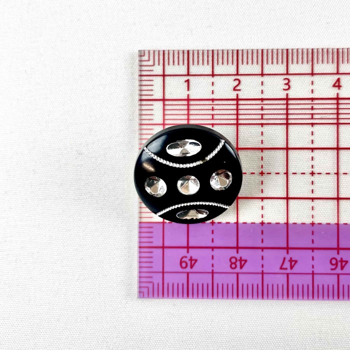 Bouton plastique bijou noir 22mm