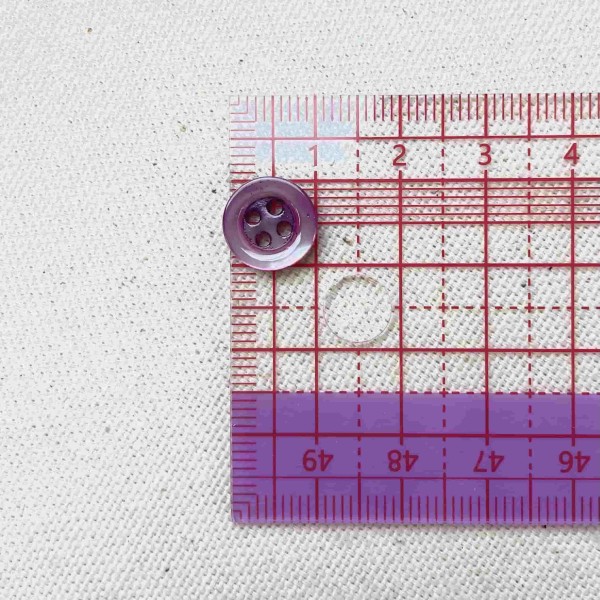Bouton nacre rond violet clair 10mm Bouton nacre rond violet clair 10mm
