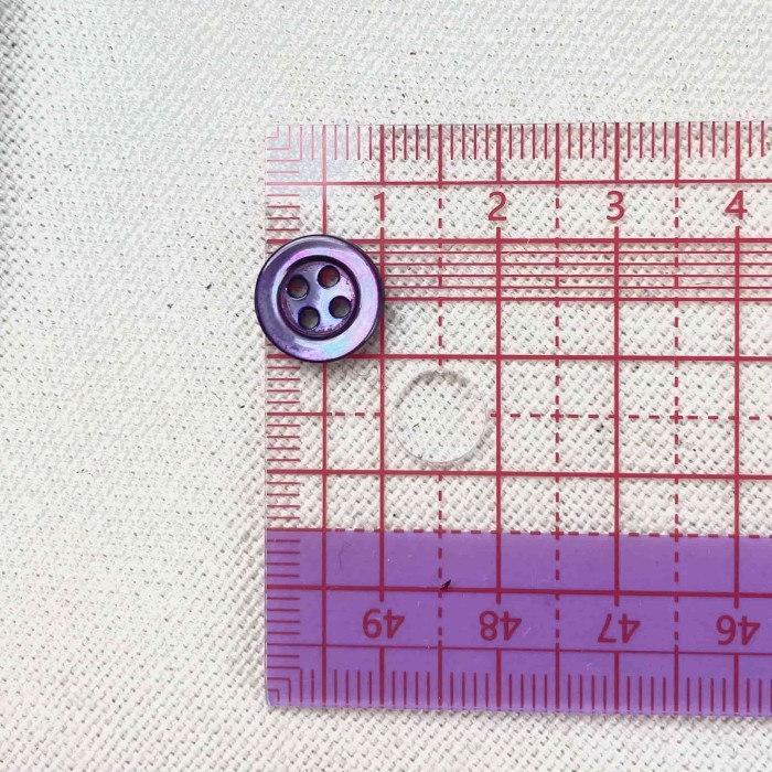 Bouton nacre rond violet foncé 10mm
