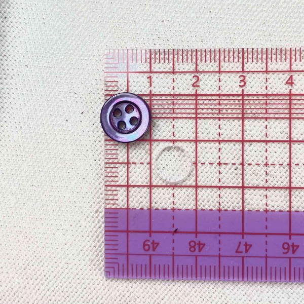 Bouton nacre rond violet foncé 10mm Bouton nacre rond violet foncé 10mm