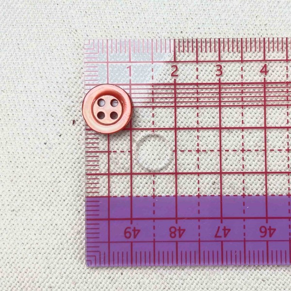 Bouton nacre rond terre argile 10mm Bouton nacre rond terre argile 10mm