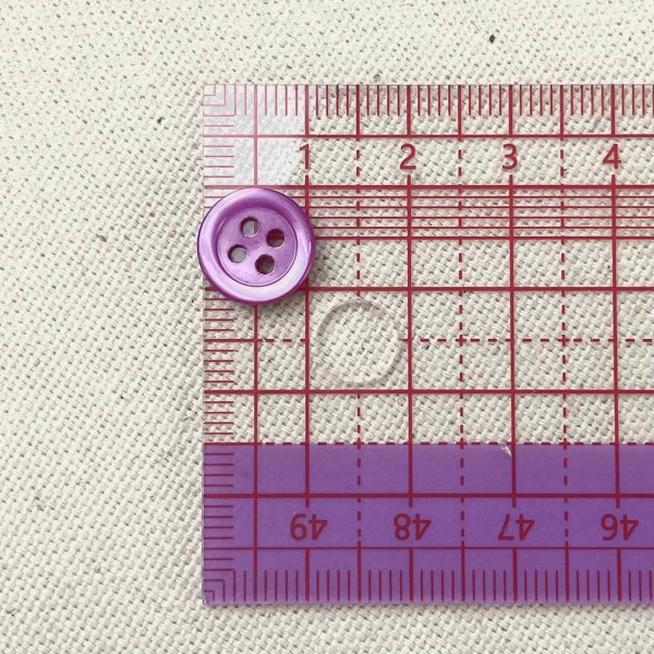 Bouton nacre rond violet rose 10mm Bouton nacre rond violet rose 10mm