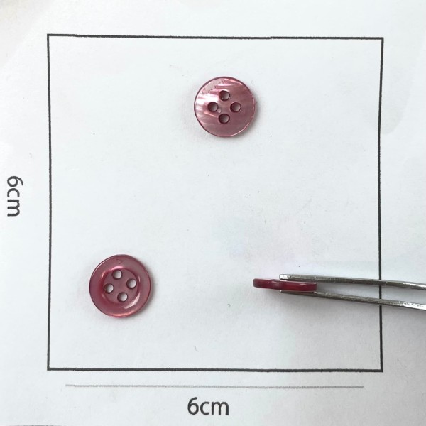 Bouton nacre rond mauve 10mm Bouton nacre rond mauve 10mm