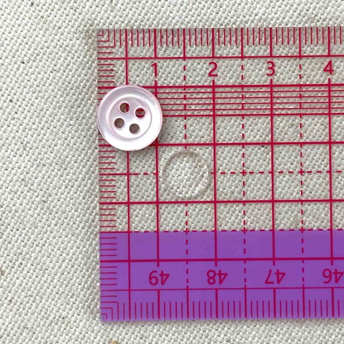 Bouton nacre rond rose clair 10mm