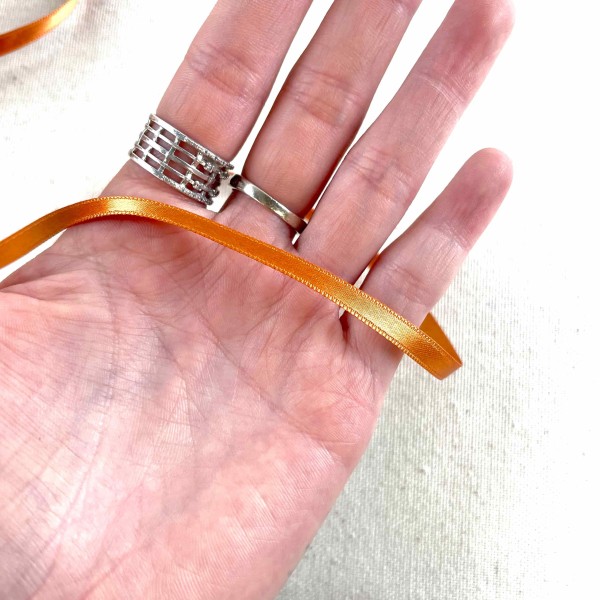 Ruban satin double face orange argile 10 mm Ruban satin double face orange argile 10 mm