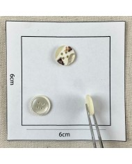 Bouton rond nacre fantaisie blanc 12mm