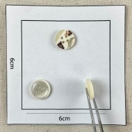 Bouton rond nacre fantaisie blanc 12mm