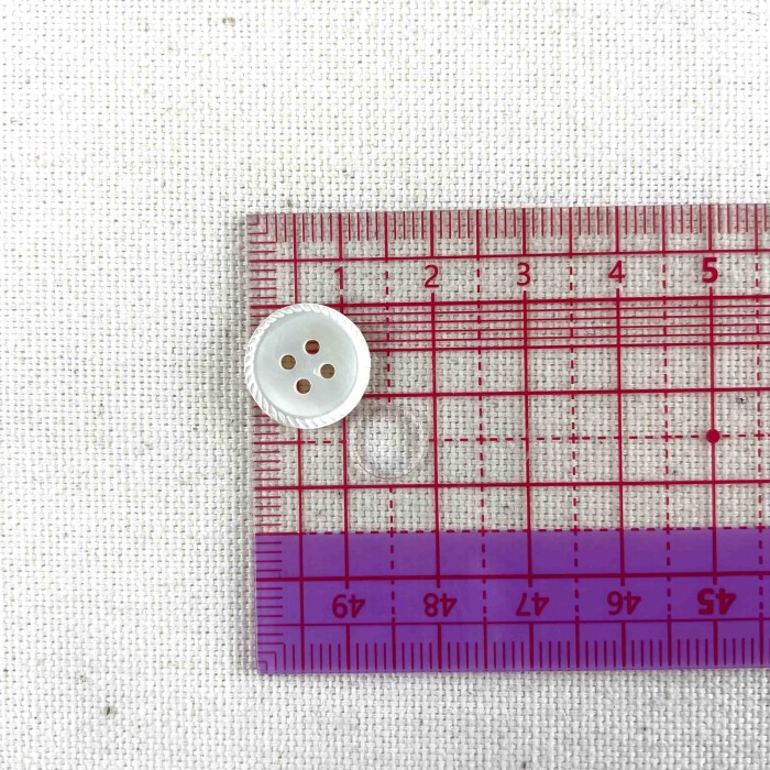 Bouton rond nacre fantaisie blanc 12mm