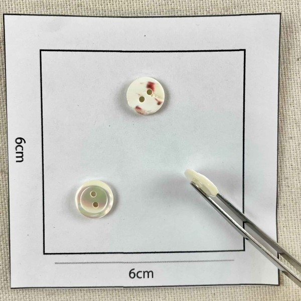 Bouton rond nacre blanc 10mm Bouton rond nacre blanc 10mm