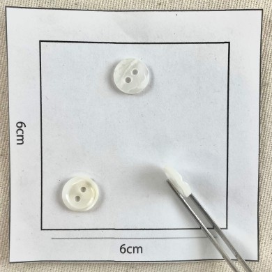 Bouton rond nacre blanc 12mm Bouton rond nacre blanc 12mm