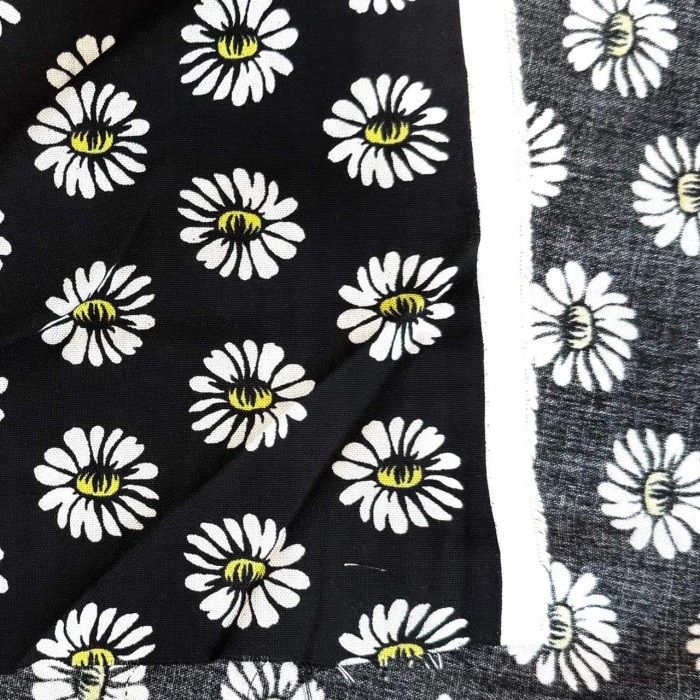 Tissu viscose pâquerette noir multicolore Tissu viscose pâquerette noir multicolore