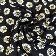 Tissu viscose pâquerette noir multicolore Tissu viscose pâquerette noir multicolore