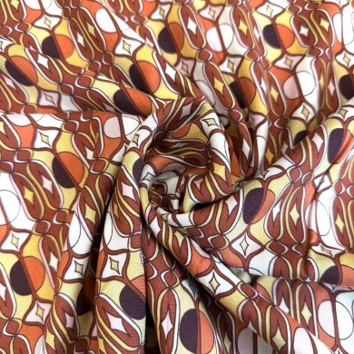 Tissu viscose géométrique art déco orange multicolore Tissu viscose géométrique art déco orange multicolore