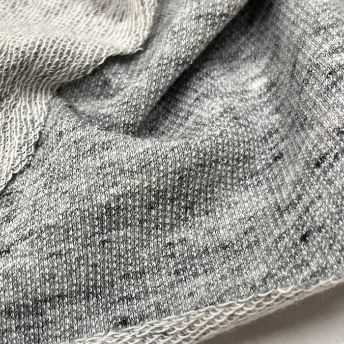 Tissu jersey molleton été moucheté gris - Marque Française