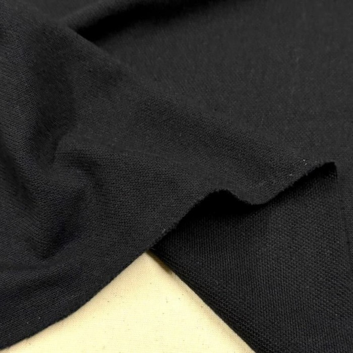 Tissu jersey maille piqué coton noir - Marque Française Tissu jersey maille piqué coton noir - Marque Française