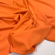 Tissu jersey coton polyester orange - Marque Française Tissu jersey coton polyester orange - Marque Française
