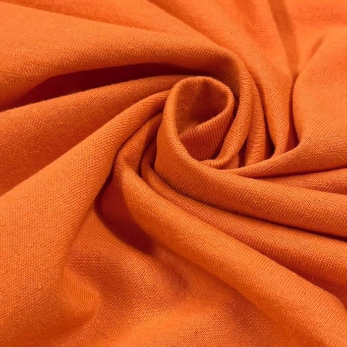 Tissu jersey coton polyester orange - Marque Française Tissu jersey coton polyester orange - Marque Française