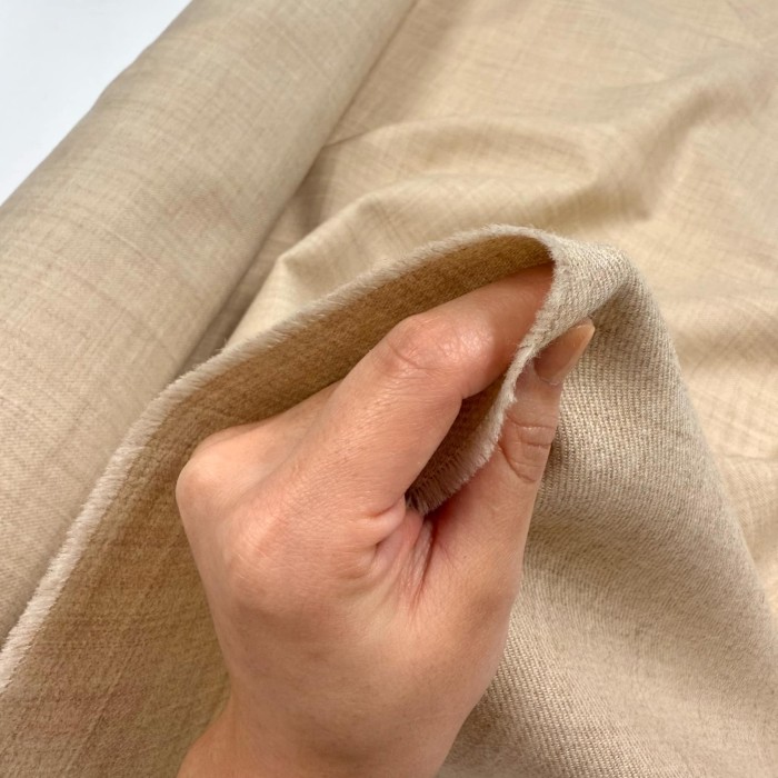 Tissu pure laine uni écru sable - Haute couture