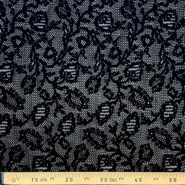 Tissu dentelle noir motifs arabesques fleuries