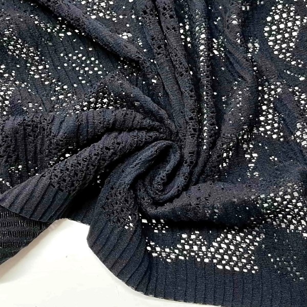 Tissu dentelle noir motifs arabesques fleuries Tissu dentelle noir motifs arabesques fleuries