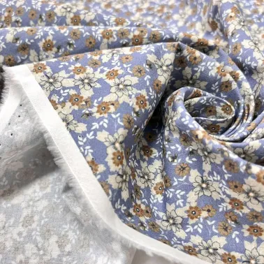 Tissu coton fleuri bleu multi-couleurs