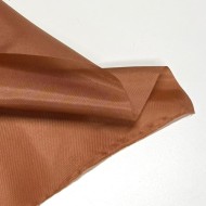 Tissu doublure polyester marron cuivré uni Tissu doublure polyester marron cuivré uni