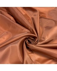 Tissu doublure polyester marron cuivré uni Tissu doublure polyester marron cuivré uni